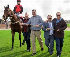 MADASSA - Belmont winner returns to scale with his jubilant owners. Photo - Western Racepix